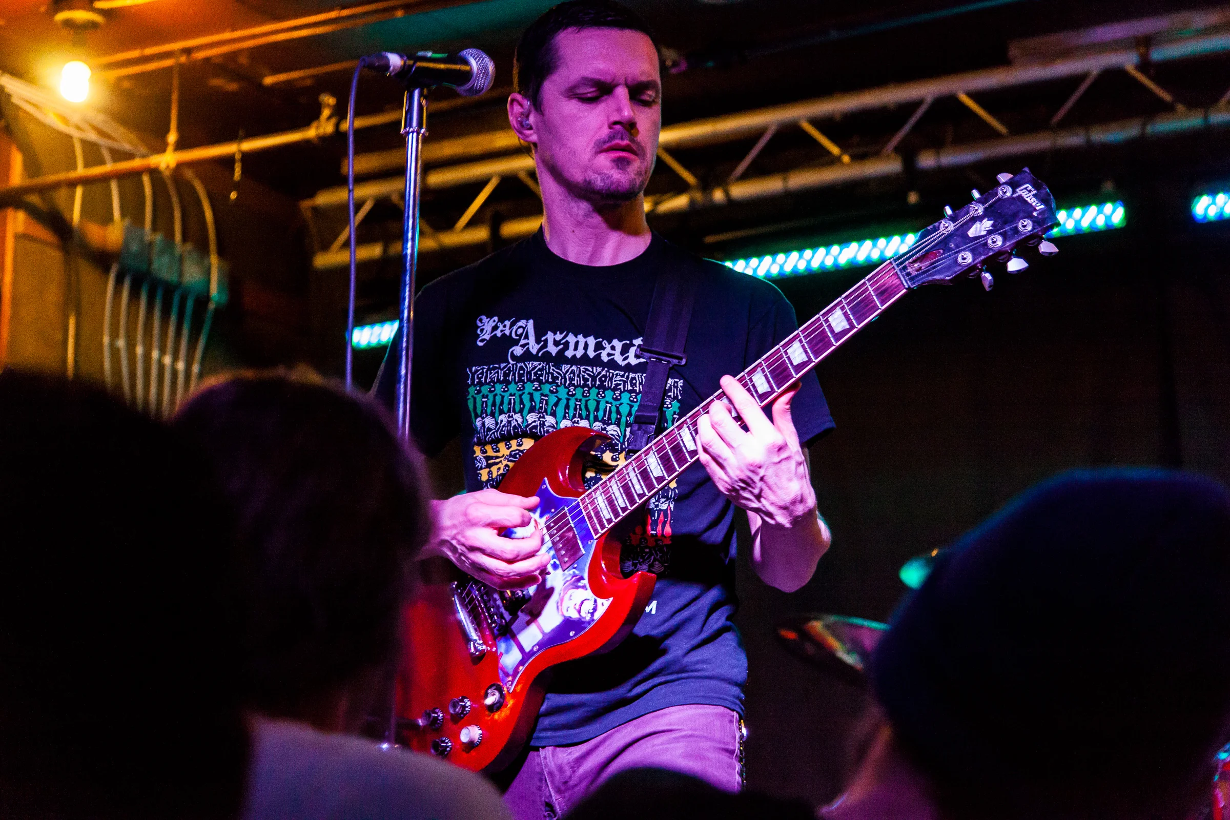 Though it was New Years Eve 2013 Propagandhi didn't grace the stage at the Windsor until just minutes after Midnight. This was one of the best evenings ever. Propagandhi, though Winnipeg locals, only ever play in their hometown once every couple years, usually in much larger venues to bigger always sold out crowds. The New Years Eve show was announced with practically no notice and tickets sold out within minutes. I stood in line on a cold December morning in the Exchange waiting for Into the Music to open their doors and pick up the hottest ticket in town. But like many others I was left in the cold, ticketless and irritable. But thanks to the kindness of friends Melissa and I, along with many of those faces behind me in line, got to ring in the New Year with some of the raddest dudes around.