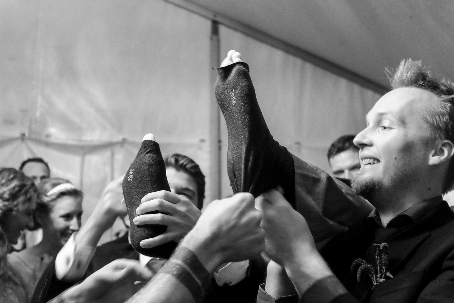 Cutting the socks of the groom is another danish wedding tradition