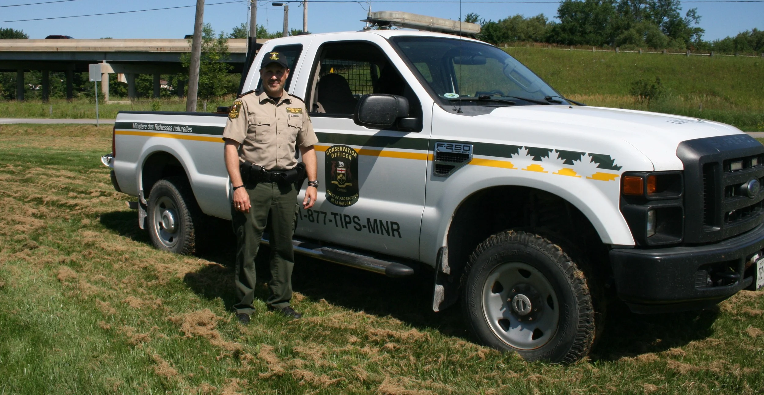 MNR Conservation Officer Mike Duncan gave great fishing advice to New Canadians Centre clients at Saturday's event.  