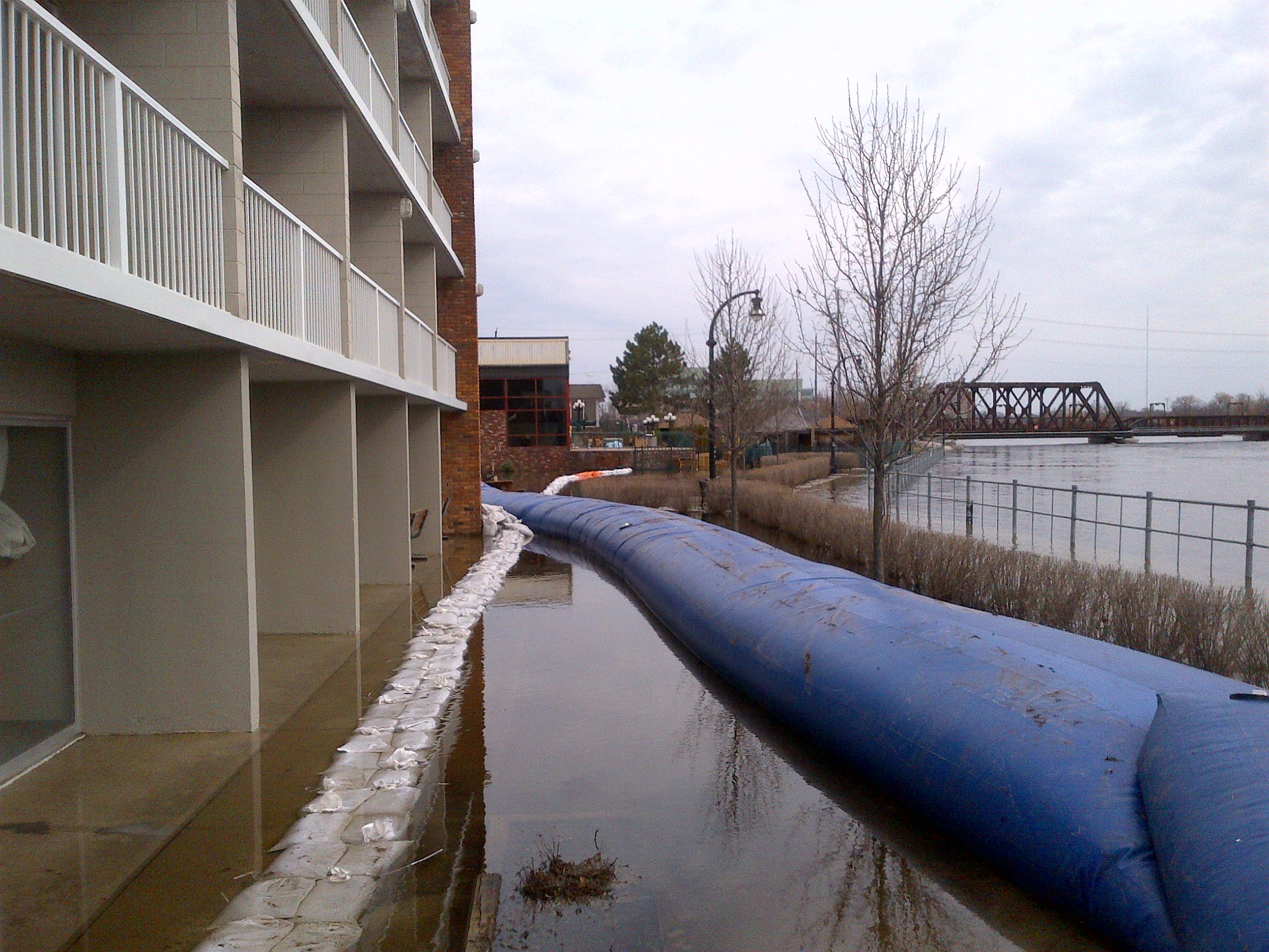 Holiday Inn, protected by sandbags and huge water bag