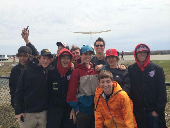 Students pose with Jim Carrey at Peterborough Airport. Pic via @ZachPremate