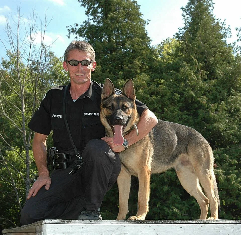 Sergeant Jeff Chartier with his K9 partner Harris.