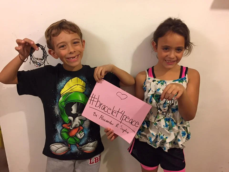 7-Year-Old Peterborough Twins Start #Bracelet4Peace Message To World