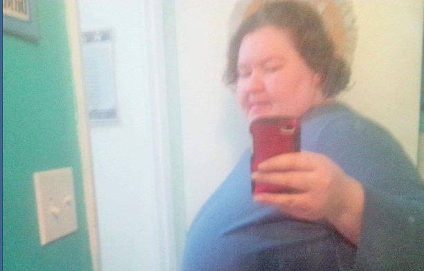 Supplied photo of Priscilla with her BlackBerry