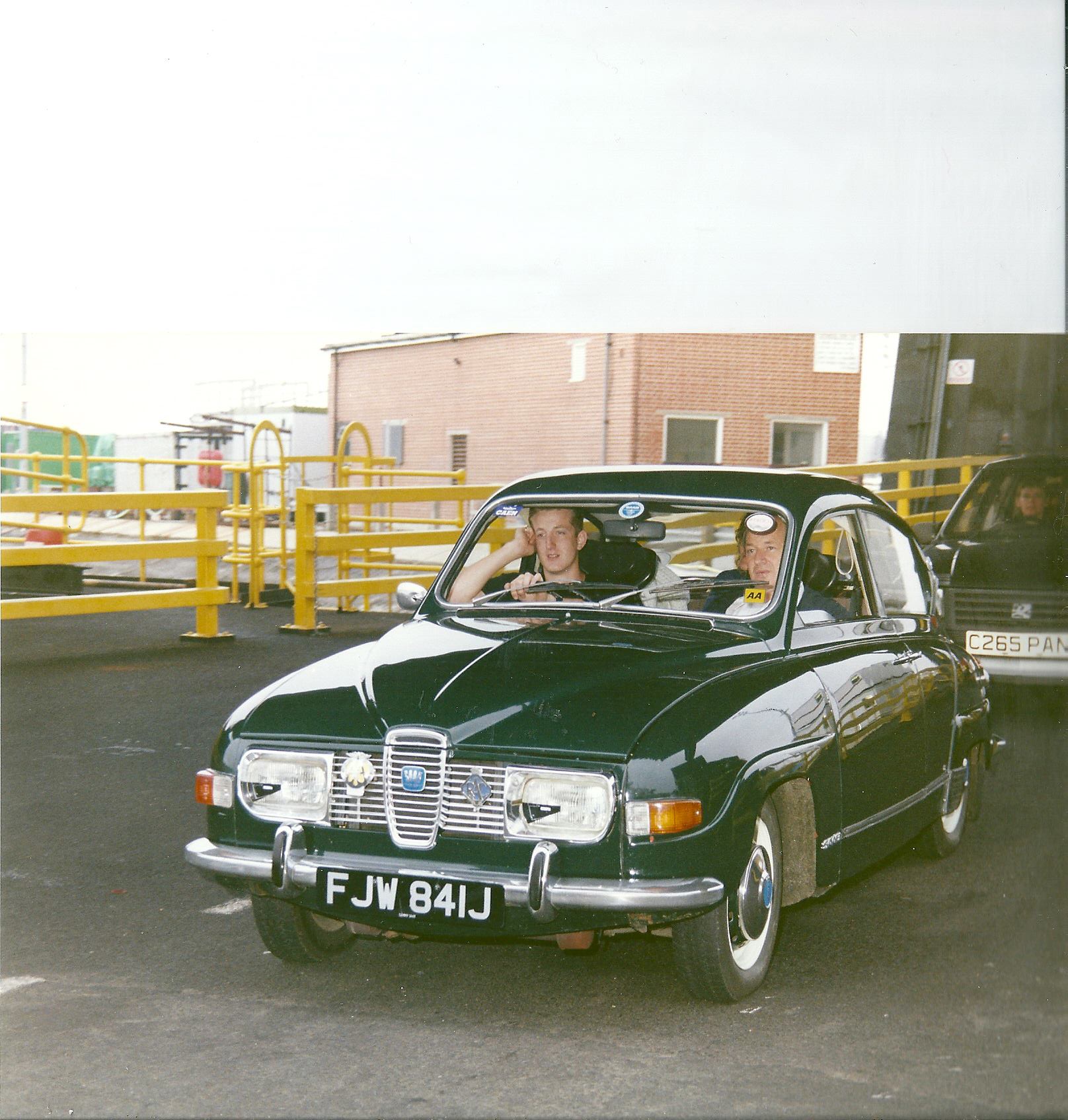 Stimpson as a teen behind the wheel with his father, Allan