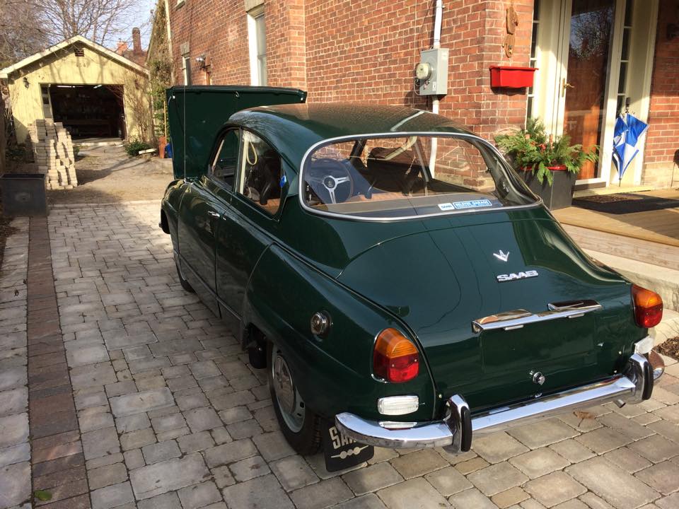 The beautiful restored car pictured with the garage Matt built to house it