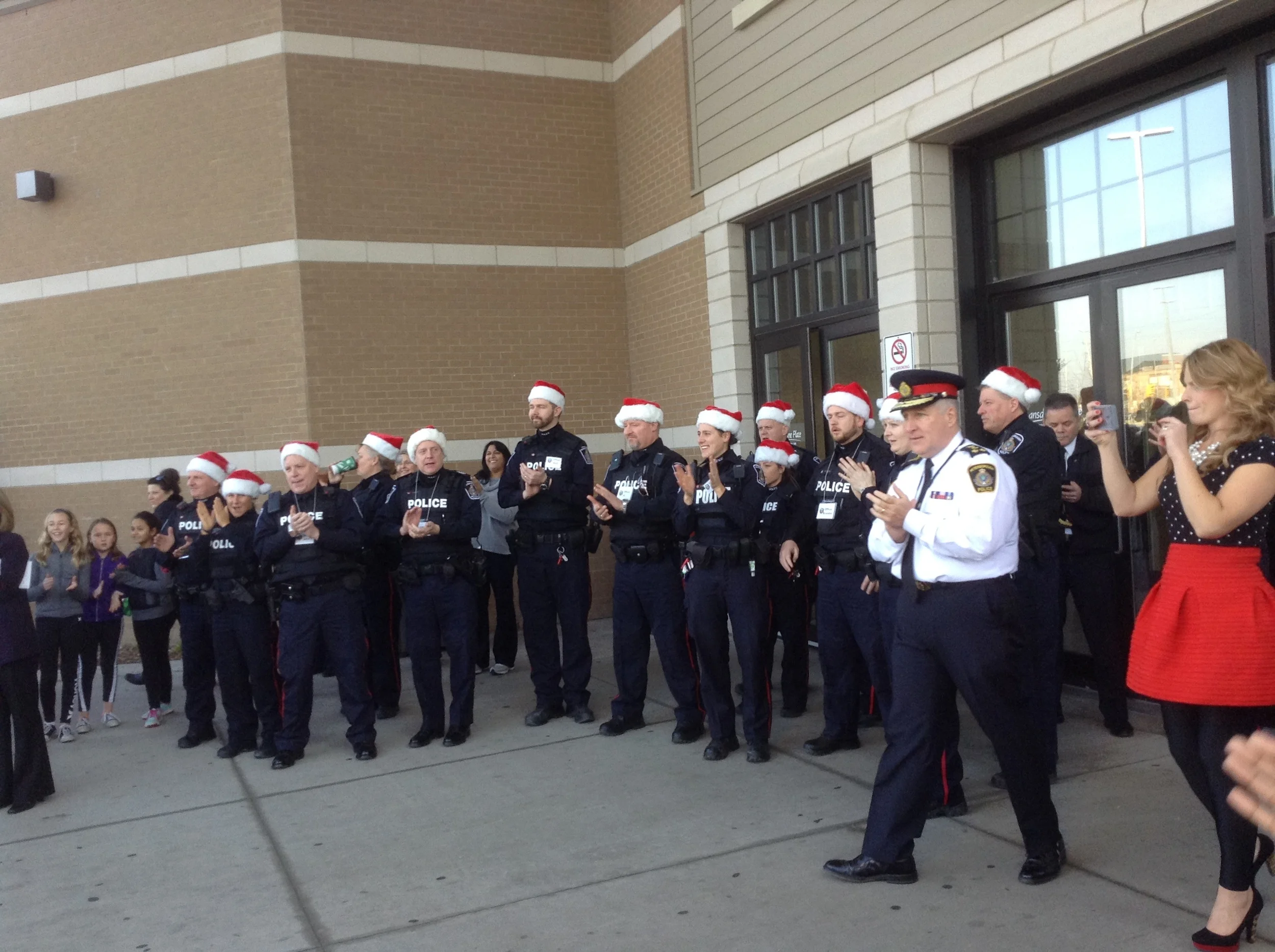 Chief Murray Rodd and officers greet the kids