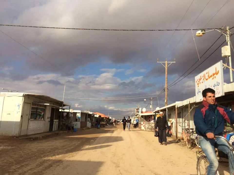 Champs-Élysées, a commercial street at Za'atari Refugee Camp which contains hundreds of small shops such as cellphone stores, dress shops and falafel stands.