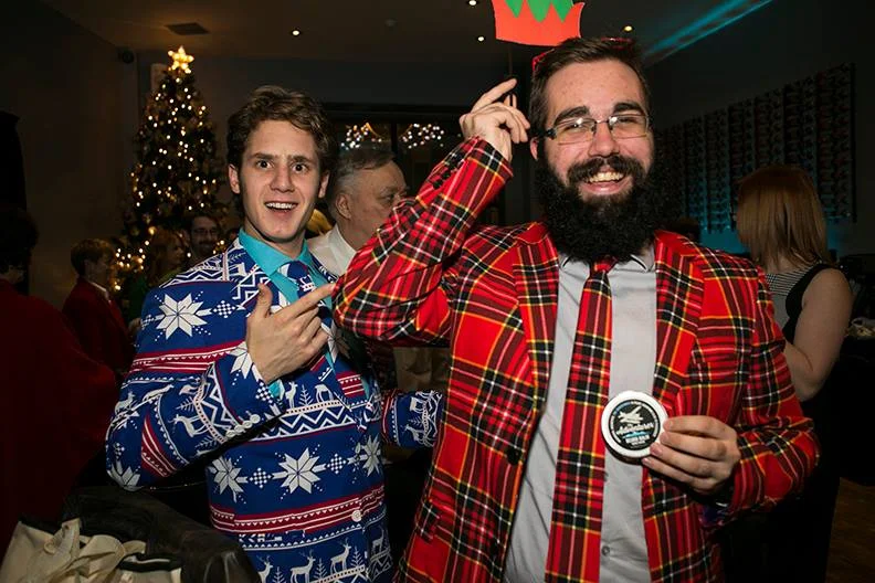 Thompson (at right) pictured with his buddy Christian Schortemeyer, who wore his own excellent suit at Christmas time