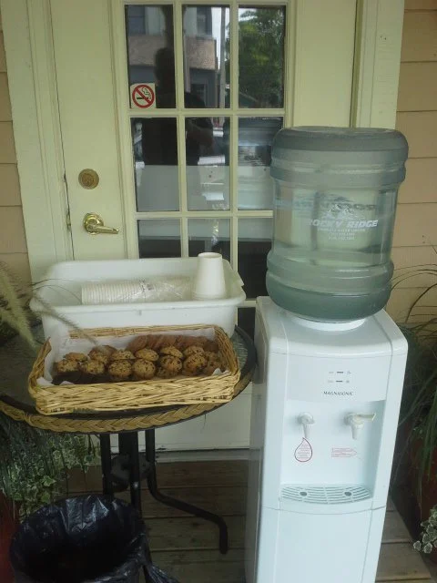 A Lakefield Cafe Closed Early Due To Heat & Left Cookies And Water Cooler Out Front