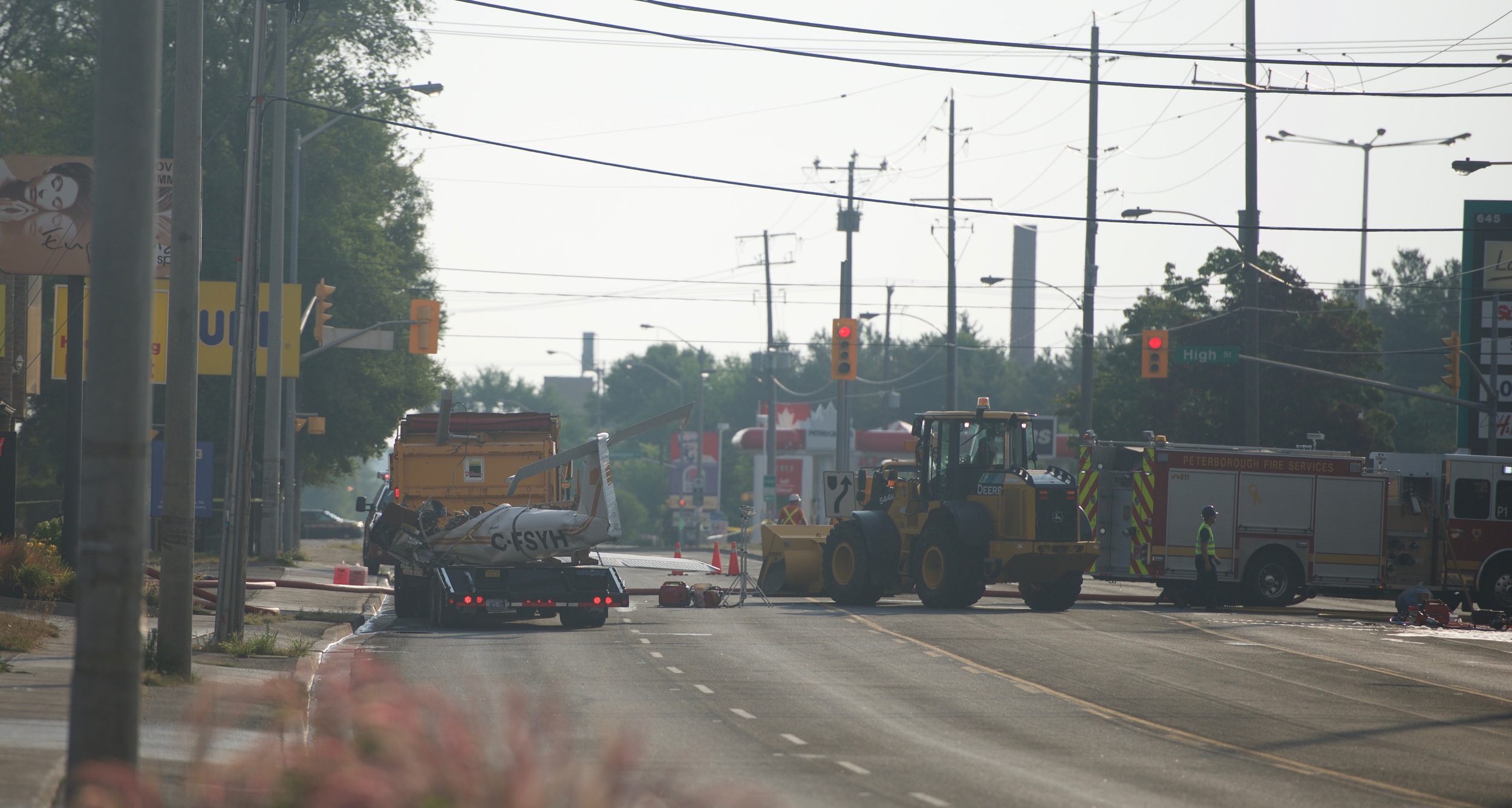 Plane being loaded onto trailer this morning. (Photo by Evan Holt)