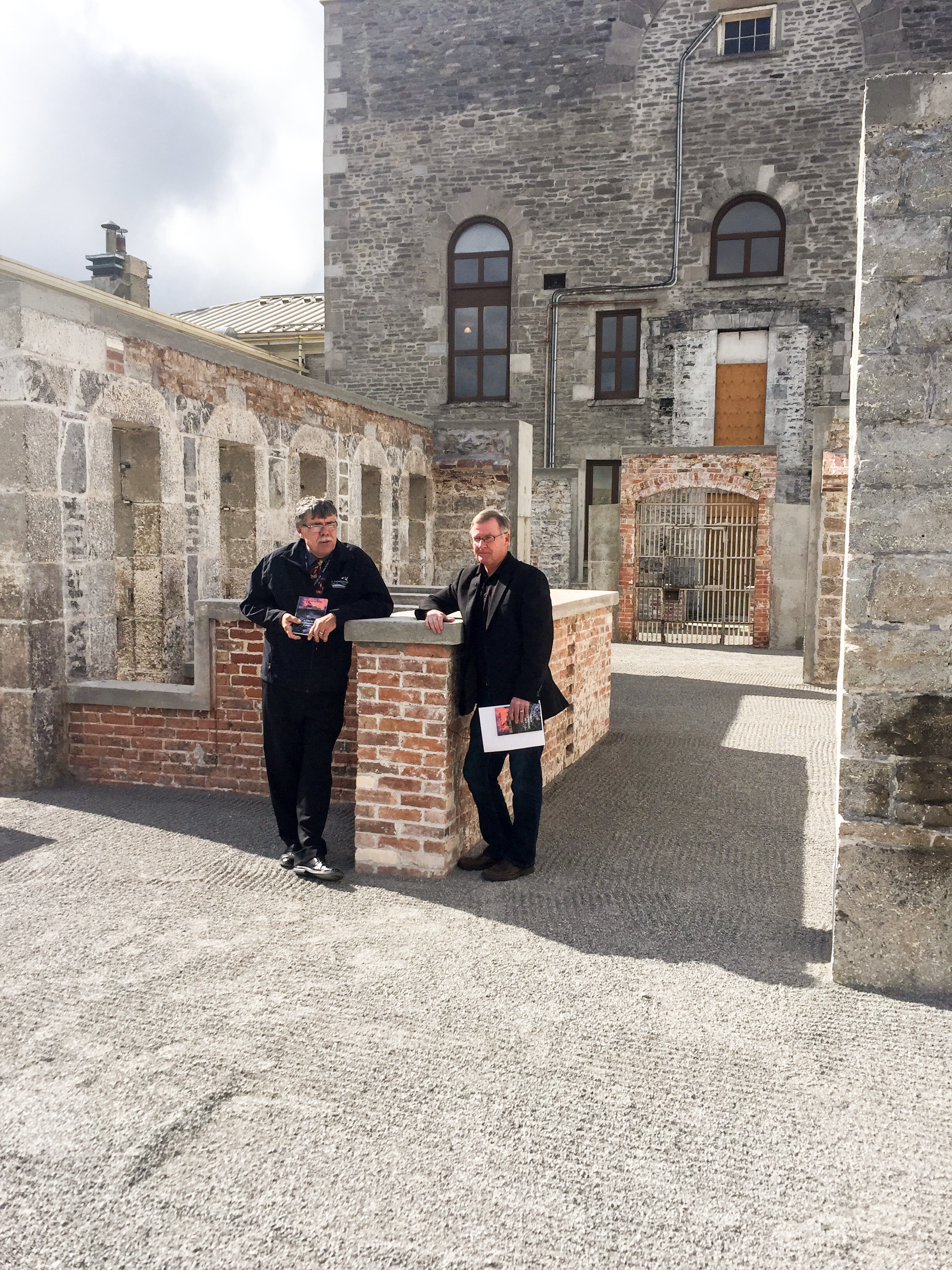 Warden J. Murray Jones (at left) with Ed Arnold at the old County Jail site (photo by Scott Arnold)