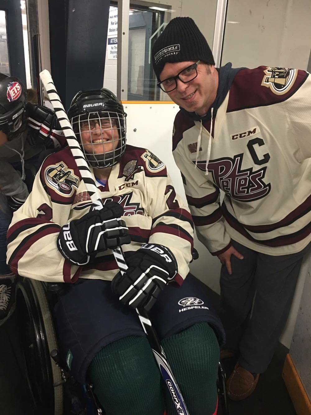 Coach Williams pictured with one of the happy players
