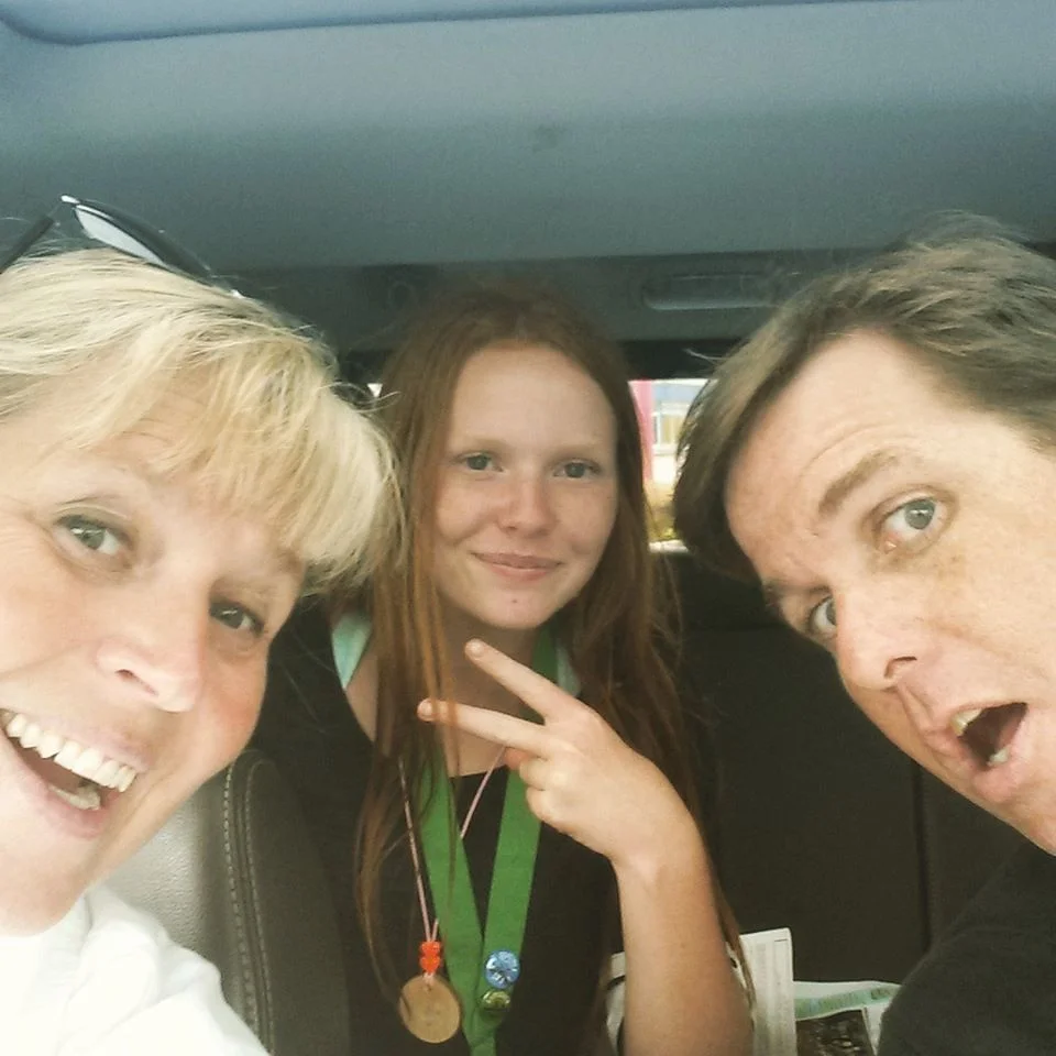 Faith pictured with her proud parents Cassie & Mike