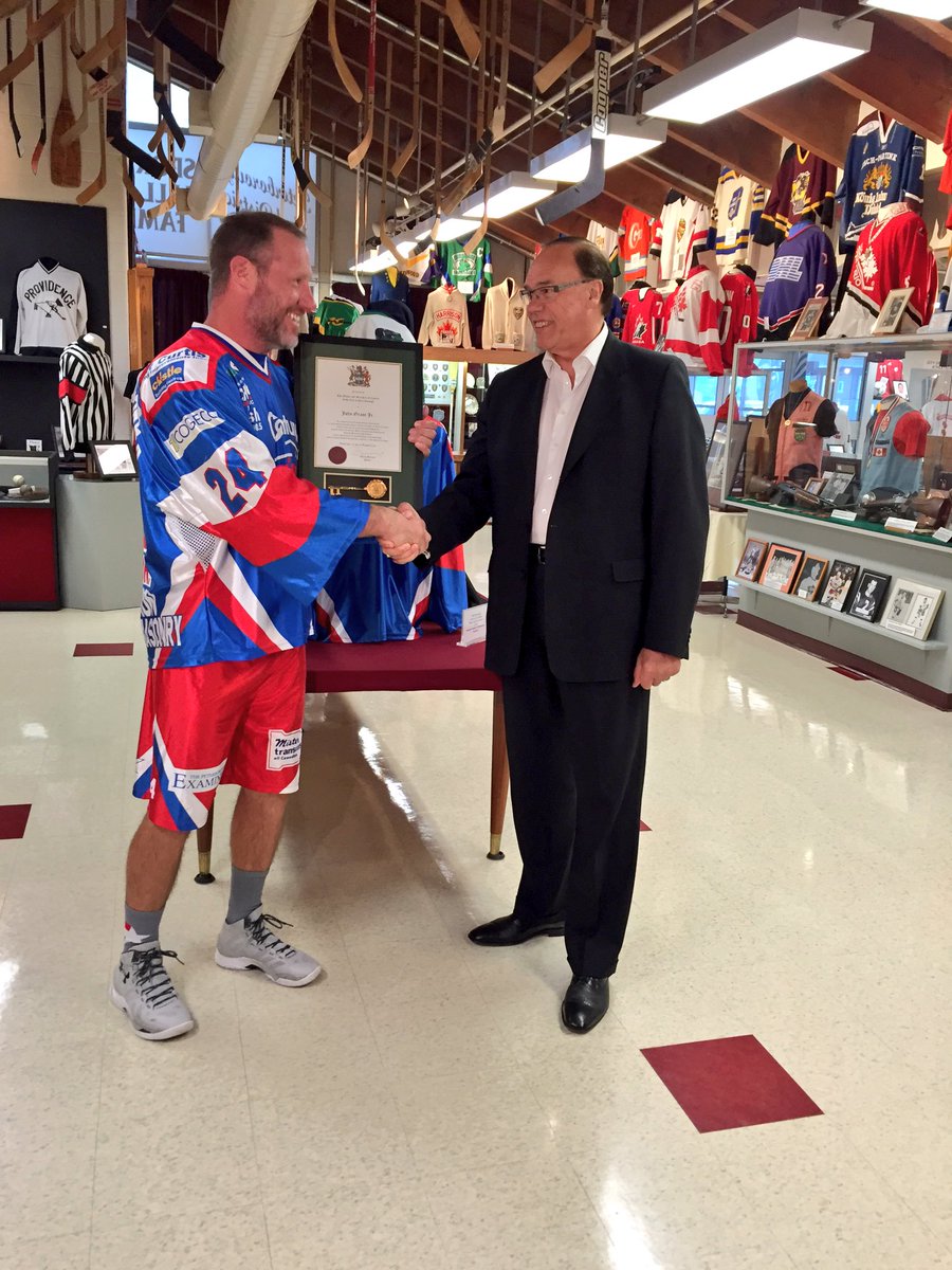 Grant Jr. being presented with a key to the city by Mayor Bennett (Photo by Scott Arnold)