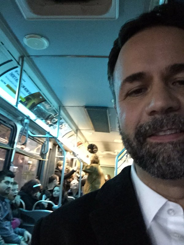 Don Vassiliadis, Chair of Transportation for City of Peterborough, riding a bus on New Year's Eve last year