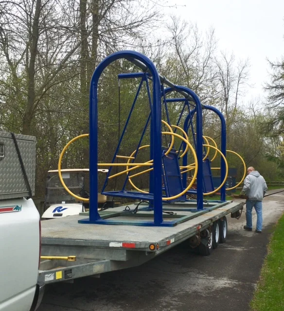 The Amazing Backstory On The Wheelchair Accessible Swings Being