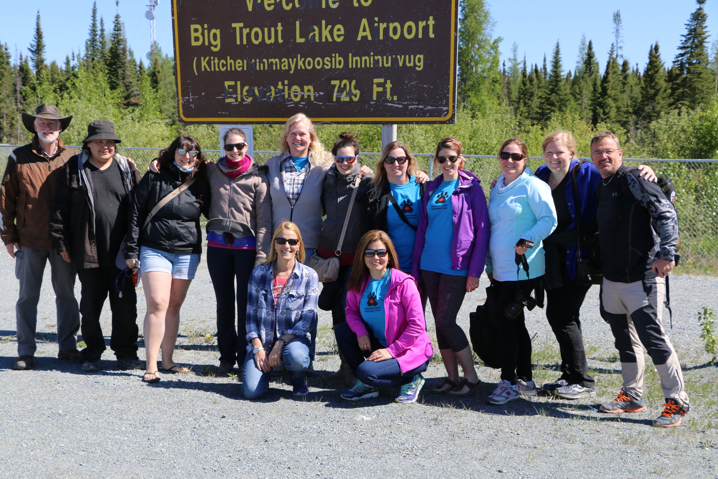 Members of animal transfer team and volunteers (Jeff Day is pictured at far right) at Big Trout First Nation (photo courtesy Peteborough Humane Society)