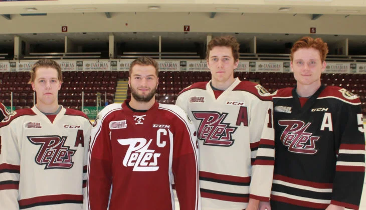 Logan DeNoble (2nd from left) named Captain of Petes