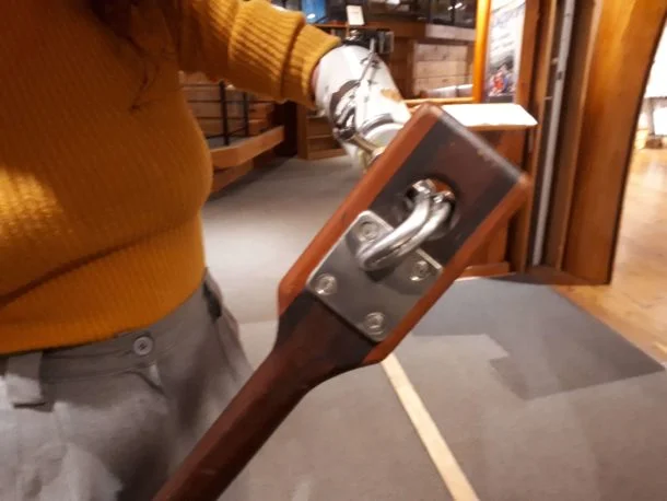 Photo of Rachel with her fitted paddle courtesy Canoe Museum