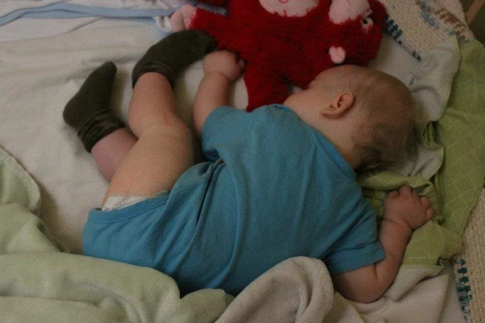 Eli as a toddler with Mimi