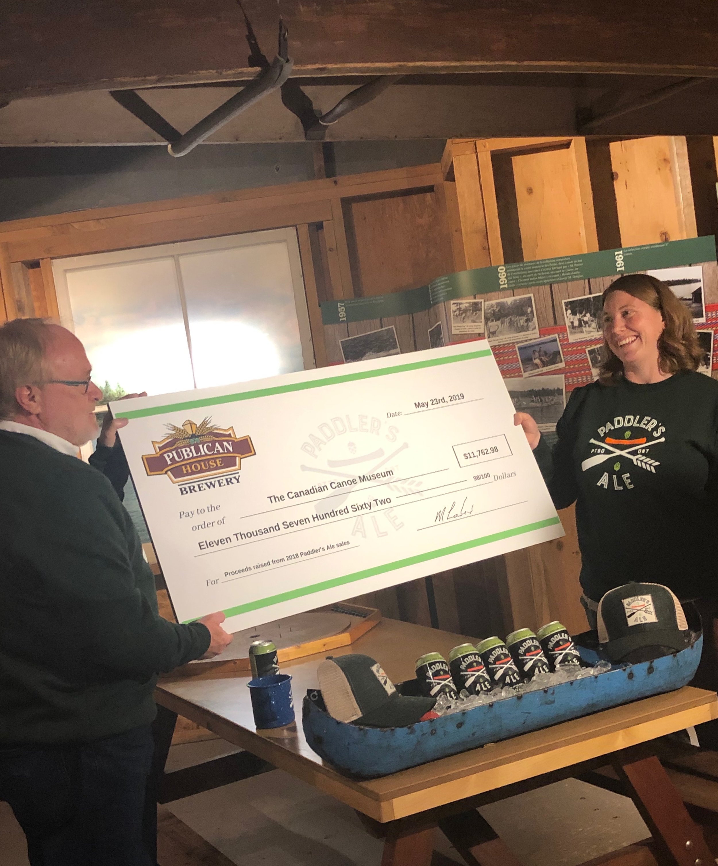 Marty Laskaris, Partner, Publican House Brewery, and Carolyn Hyslop, Executive Director, Canoe Museum (Photo courtesy Canadian Canoe Museum)