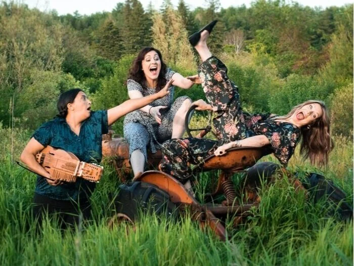 Saskia Tomkins (left), Megan Murphy (middle)  and Kate Suhr (right). Tomkins plays the violin, viola, cello and nyckelharpa for the show onstage. Photo Courtesy of Tristan Peirce Photography and 4th Line Theatre.