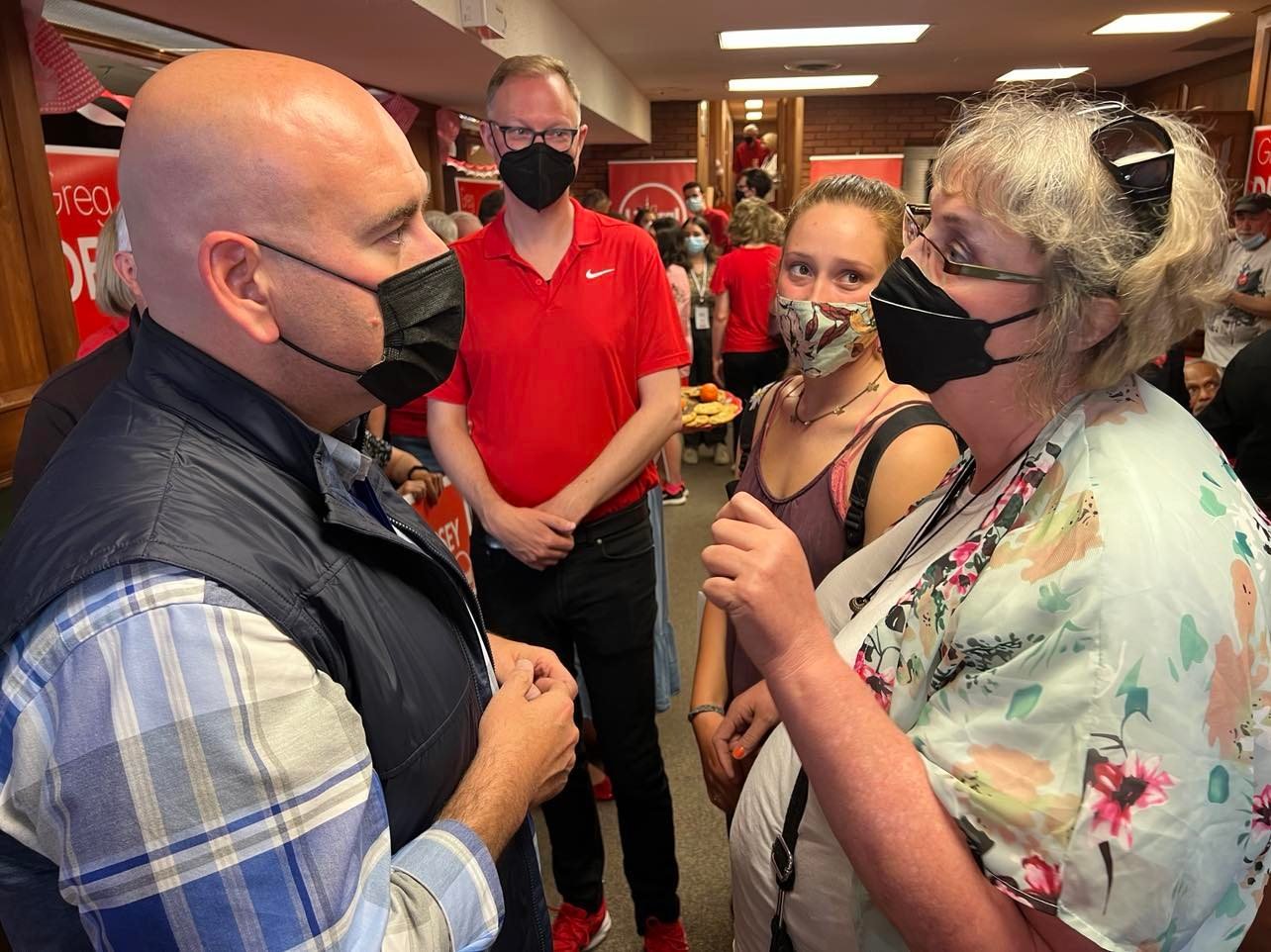  Ontario Liberal Party Leader Steven Del Duca (left) speaks with a supporter with Peterborough-Kawartha Liberal candidate Greg Dempsey looking on. Photo by David Tuan Bui. 