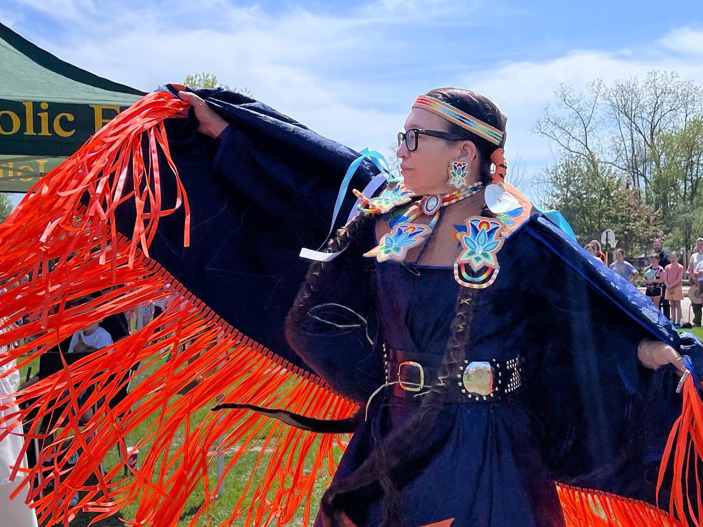 Kelli Marshall of Hiawatha First Nation (pictured) dances in a fancy shawl at a pow wow at St. John Catholic Elementary School. All photos by David Tuan Bui.