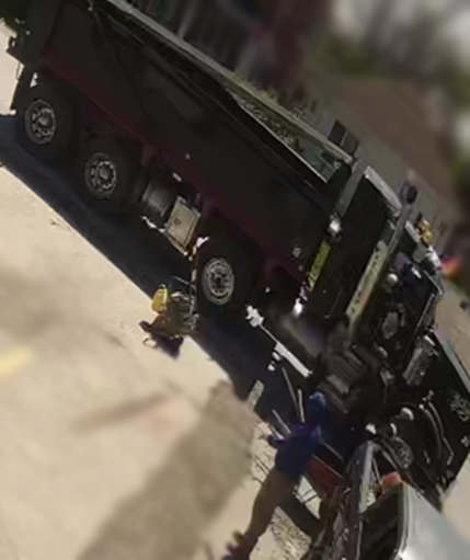 Dump Truck with Red along bottom of Dump Bin.