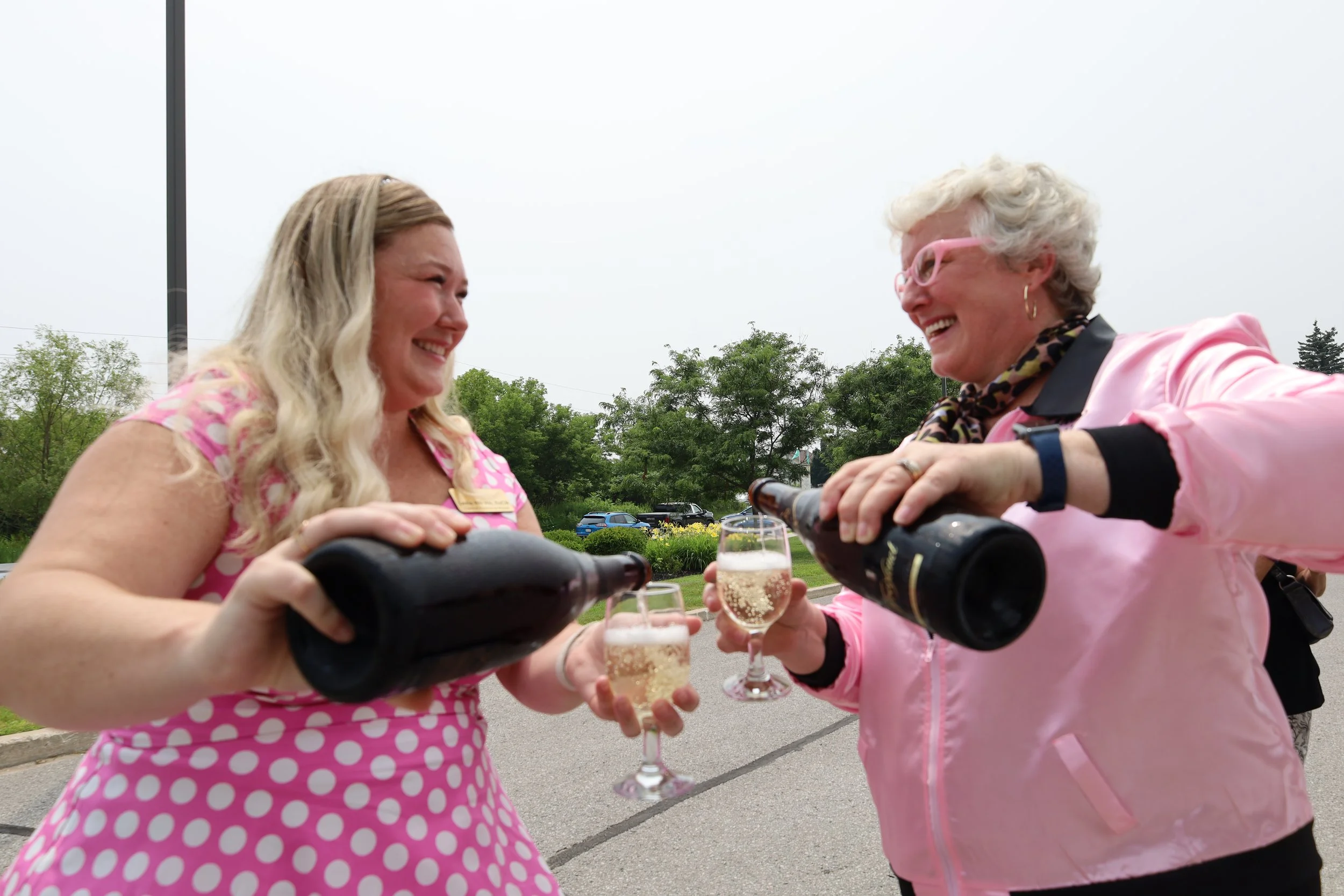Lexi Hill, clinical resource nurse and Vicki Coppins, director of dietary services, celebrating the 50s with some bubbly for the residence's 20th anniversary. All photos by David Tuan Bui.