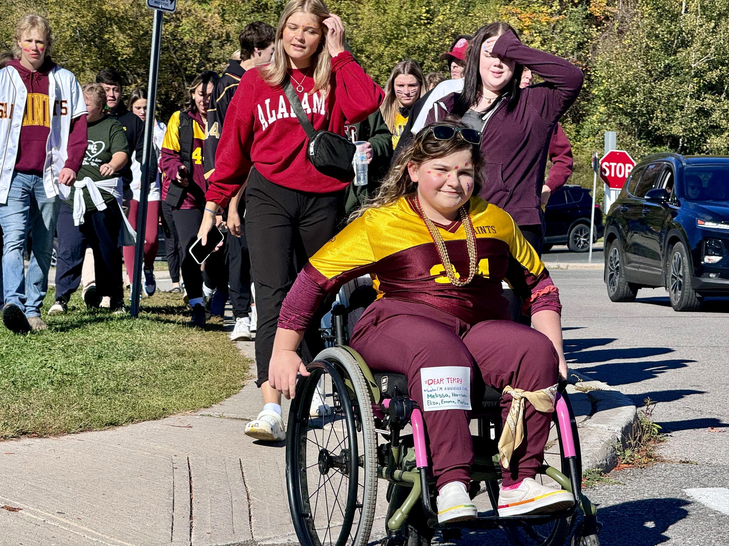 Neave Alderson leads the charge for St. Peter's Secondary School in a joint effort with Holy Cross Secondary School for the Terry Fox Rally. All photos by David Tuan Bui