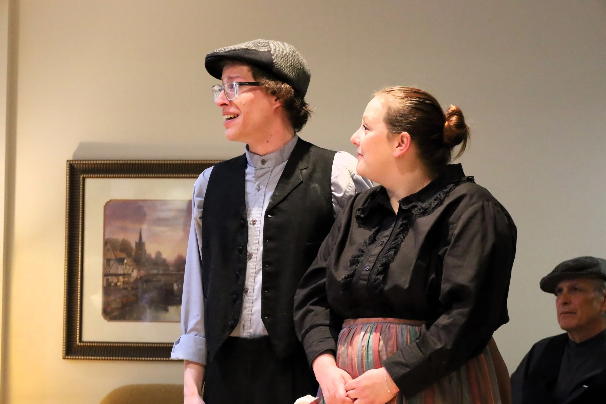 Drew Mills (left) as David and Lauren Murphy (right).