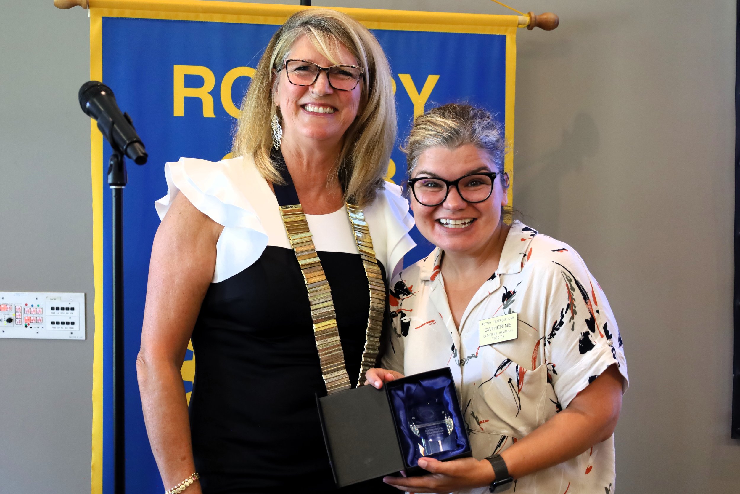 Catherine Hanrahan, Rotary director of public relations,  is named the other Rotarian of the year.