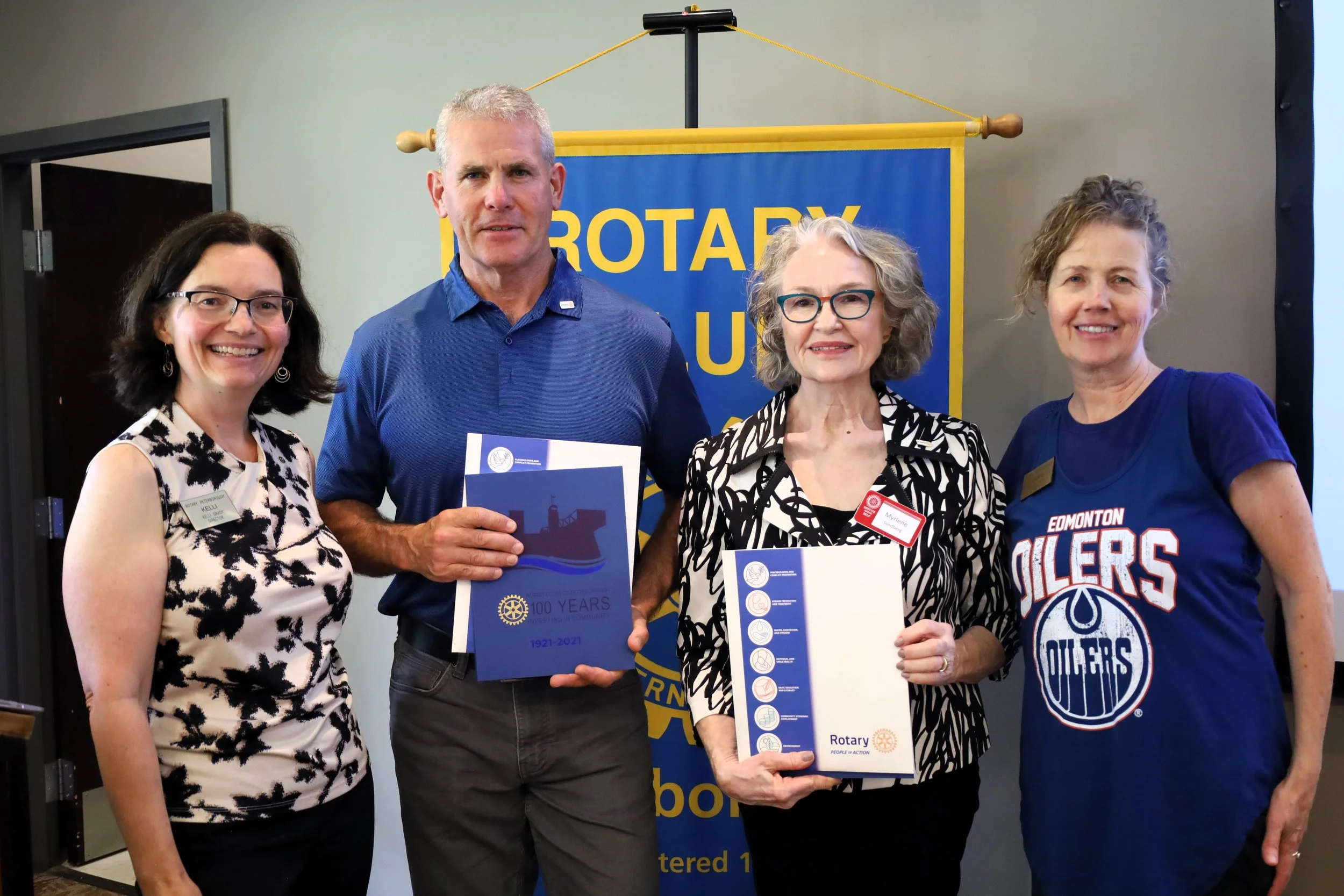 The rotary welcomes Tim Maloney (second from left) and Myrlene Sundberg (second from right) as new members of the Rotary Club.