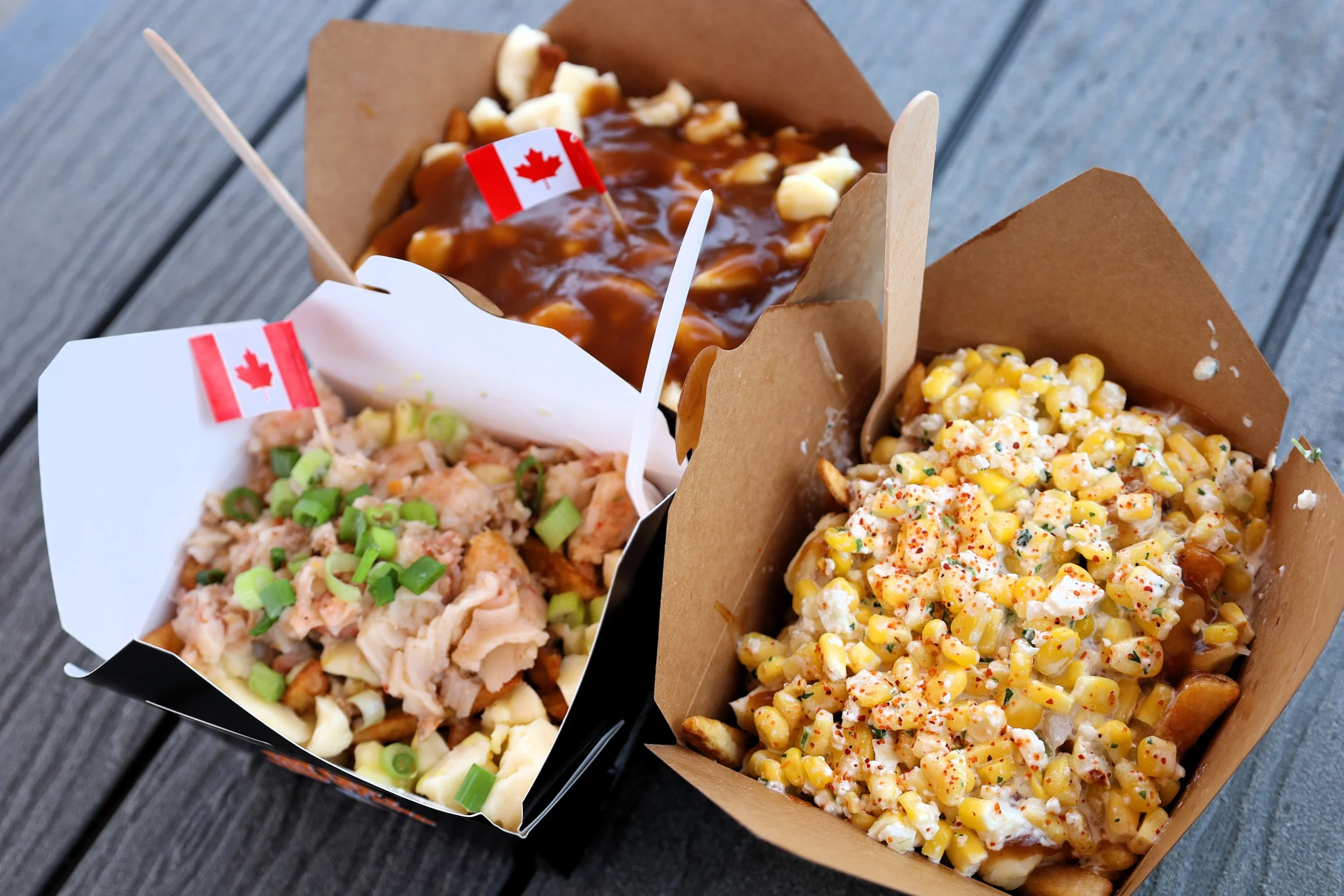 Lobster poutine (left), classic poutine (top) and Mexican Street Corn poutine (right) are some old and new poutines featured at this year's event. All photos by David Tuan Bui.