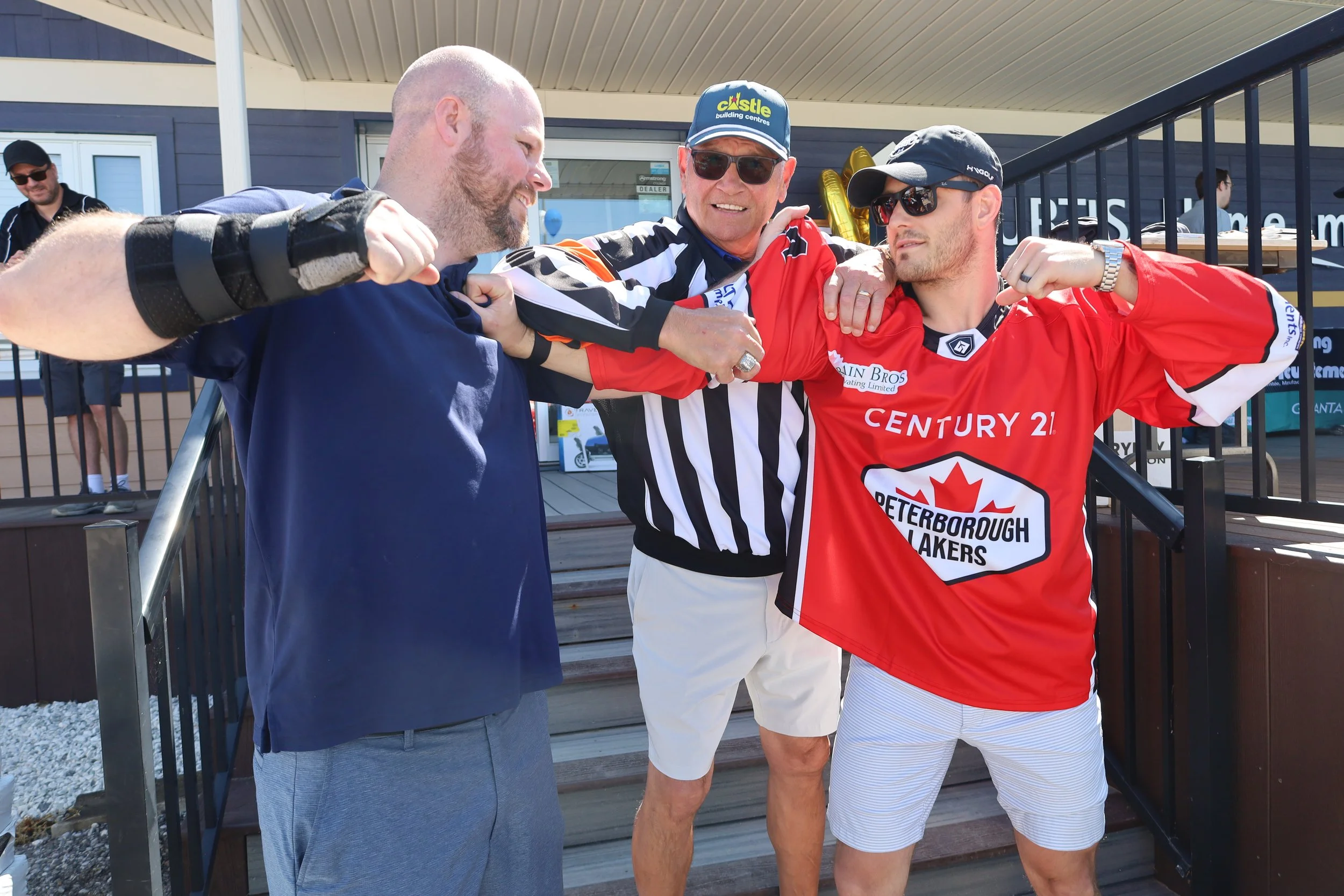 Retired NHL referee Don Koharski (middle) breaks up a scuffle between Chase Curtis of Alf Curtis (left) and Lakers defenseman Broedie Birkhof (right).  All photos by David Tuan Bui.