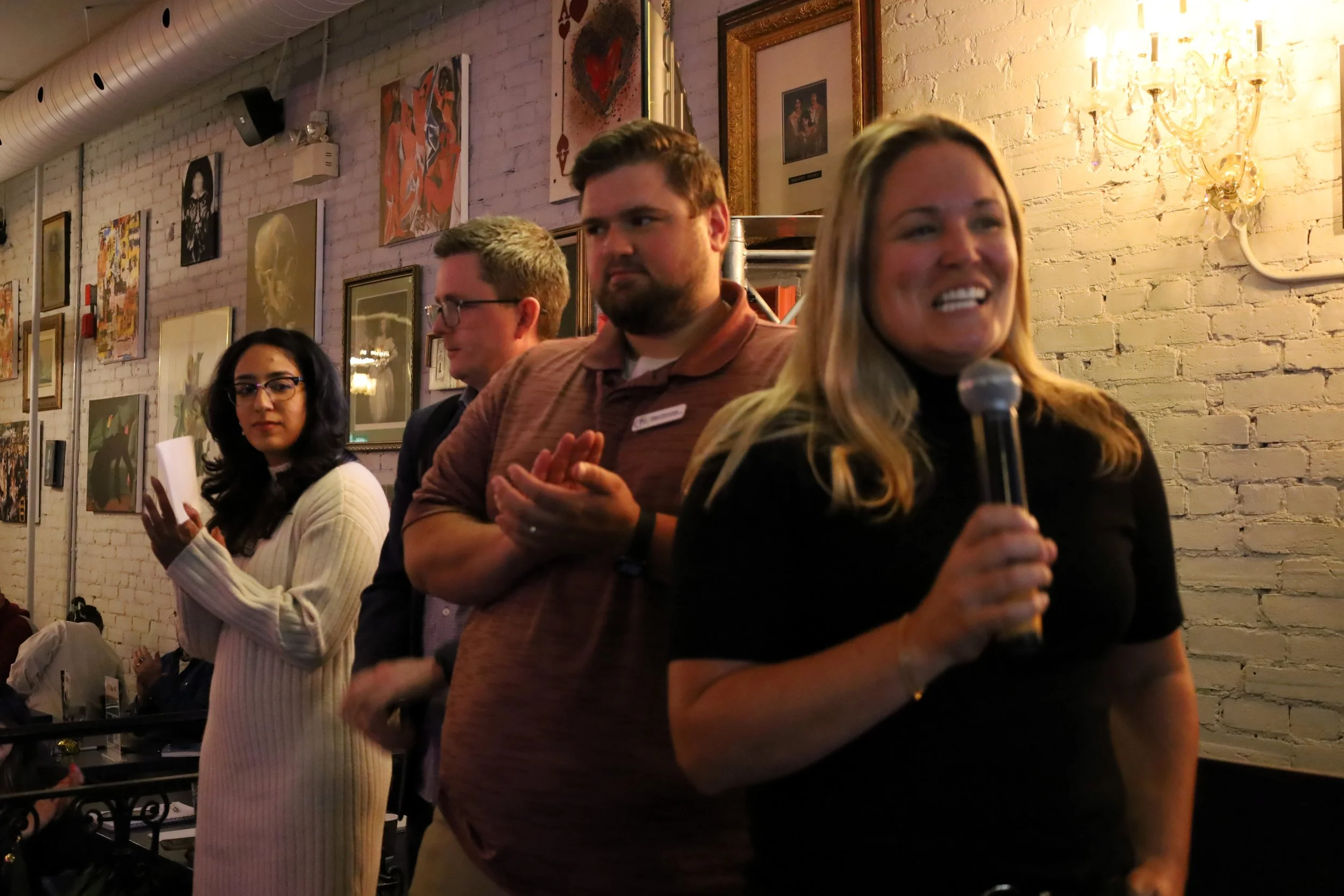 Devon Girard, CFP executive director (far left) addresses the audience after their lunch break at the El(p). All photos by David Tuan Bui.