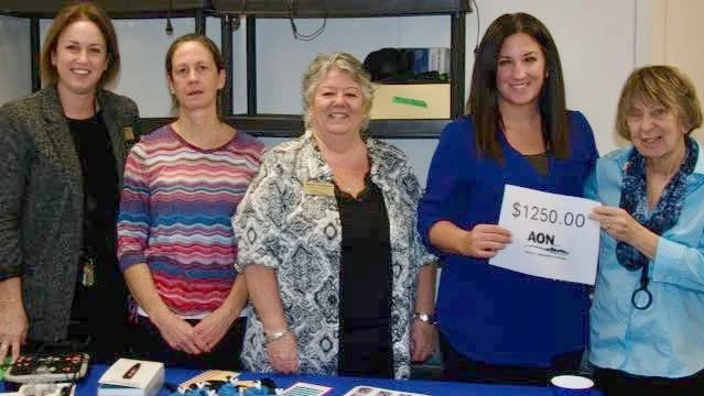 Canadian Council of the Blind Receives $1,250 Donation From AON Inc.