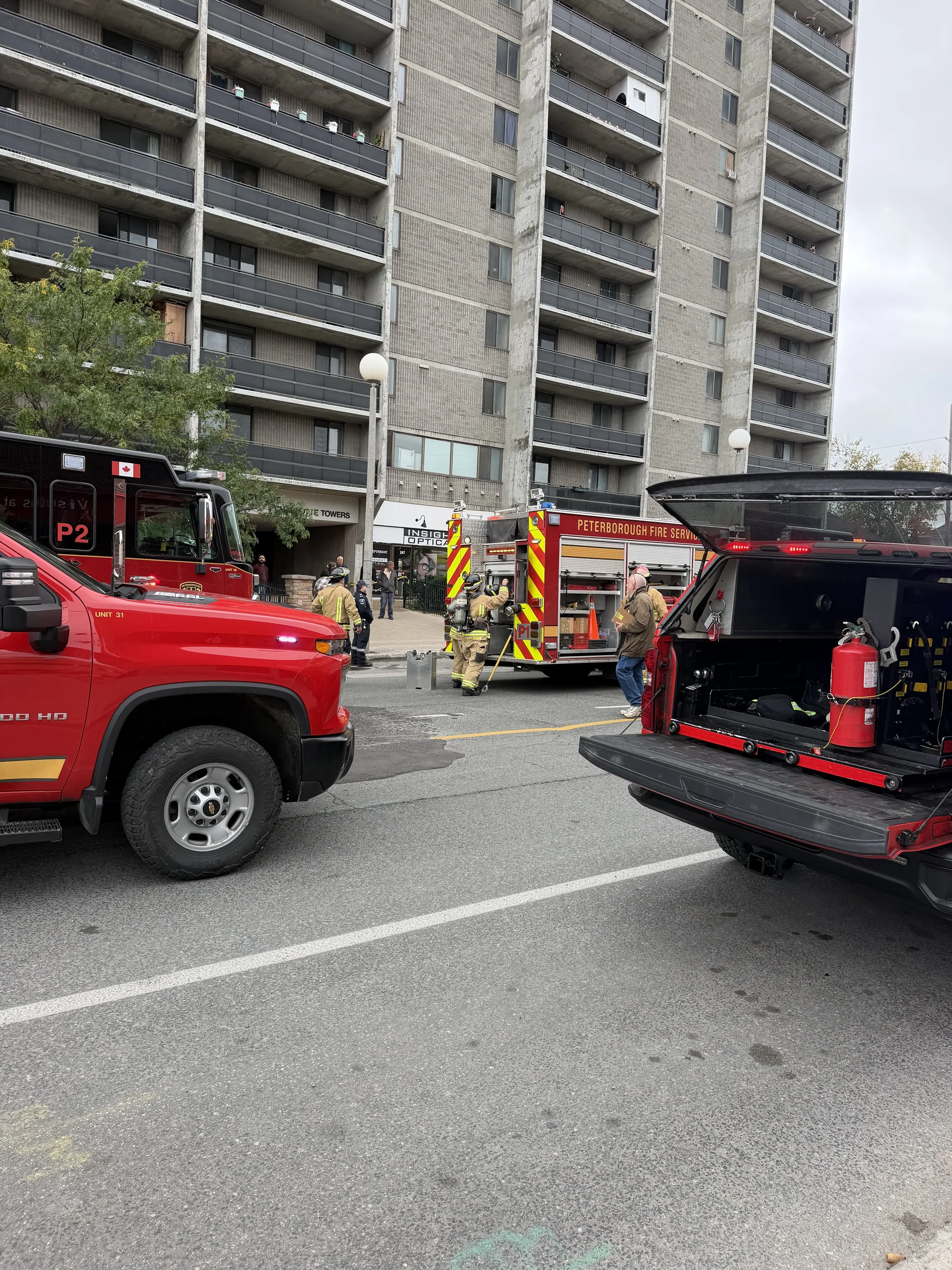 Firefighters respond to a balcony fire on the seventh floor of Charlotte Towers in downtown Peterborough on October 14th.