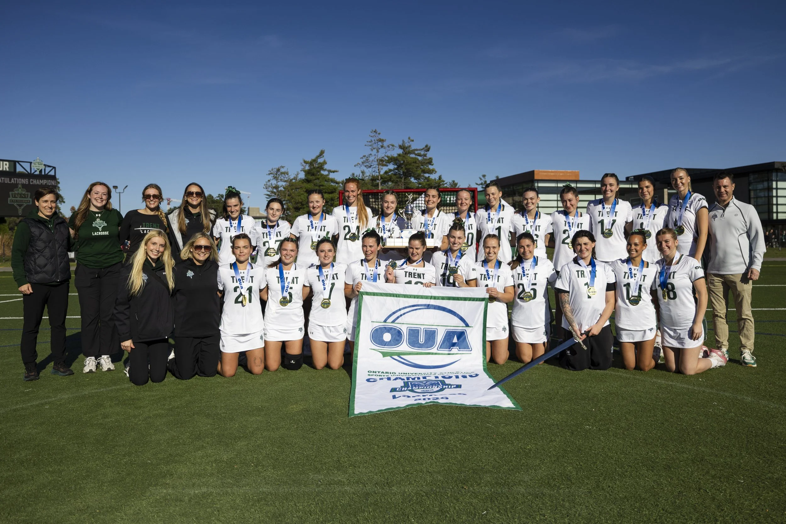 The Trent Excalibur women's lacrosse team are Ontario University Athletics (OUA) champions for the second consecutive year after defeating Wilfrid Laurier 16-3 in Sunday's gold medal game at Justin Chiu Stadium.