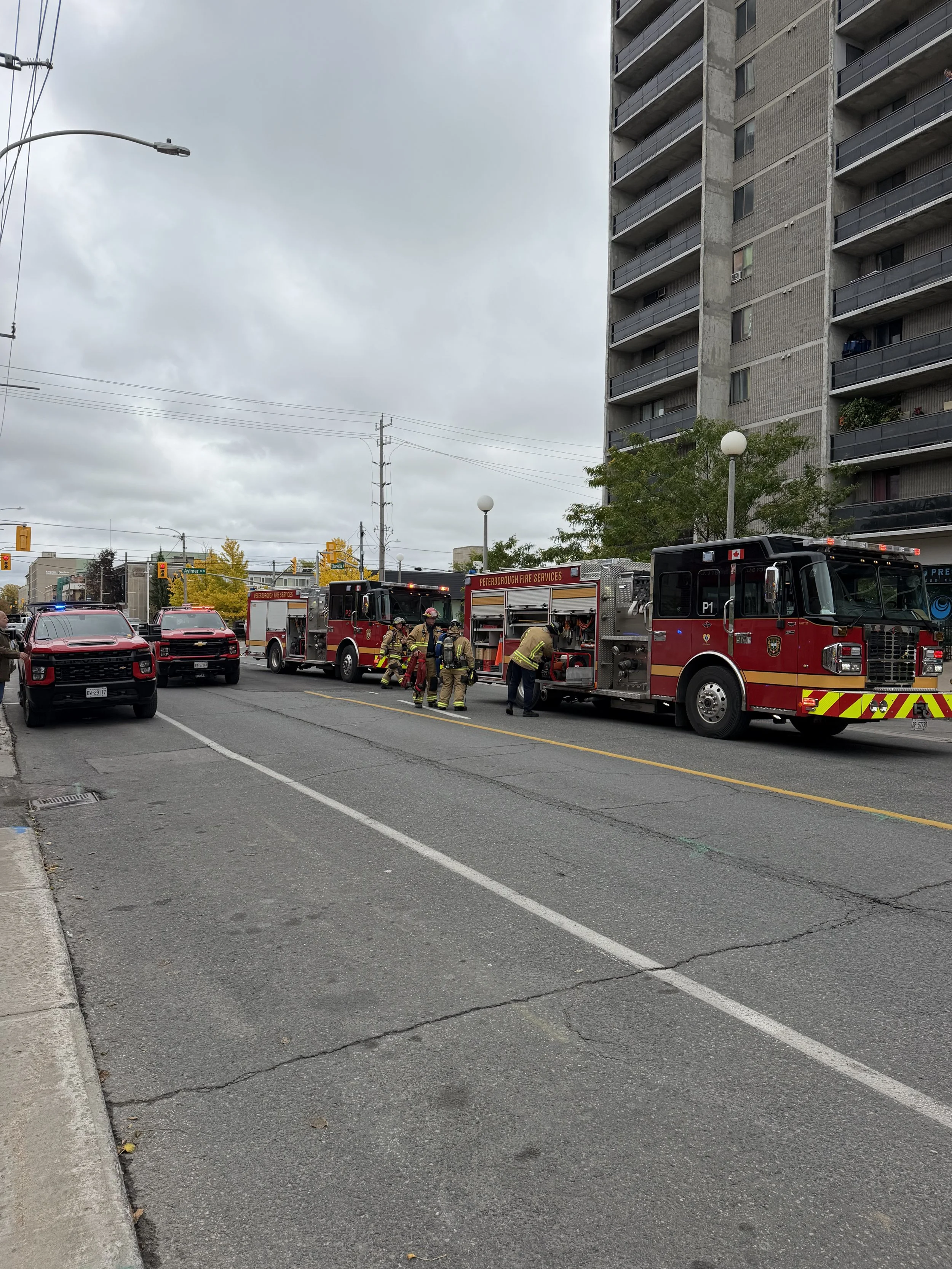 Firefighters respond to a balcony fire on the seventh floor of Charlotte Towers in downtown Peterborough on October 14th.