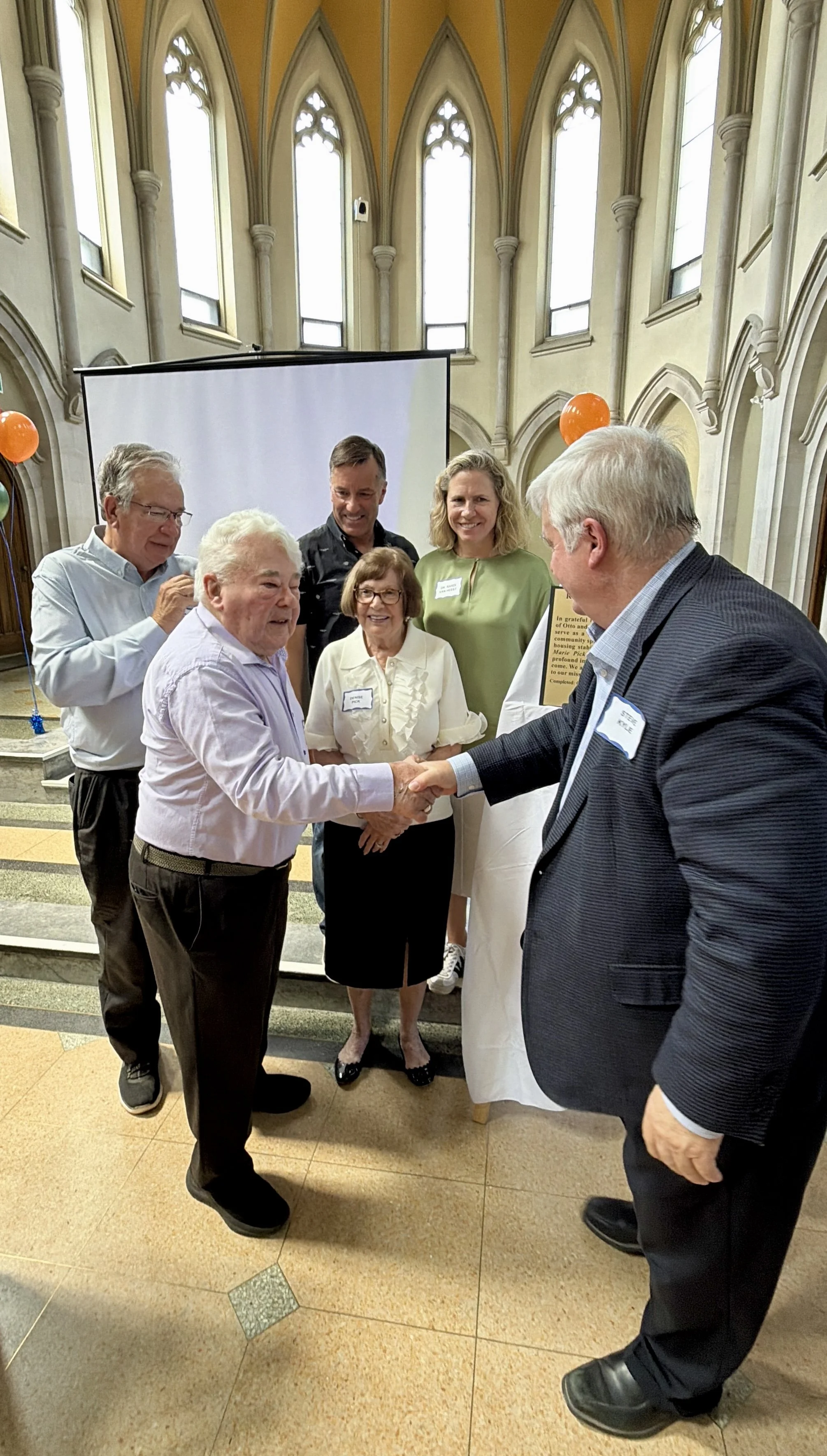 Mayor Jeff Leal and MPP Dave Smith, joined Mount Community Centre staff, volunteers and supporters in celebrating both the family's legacy and the impact the new apartments will have on affordable housing in Peterborough.