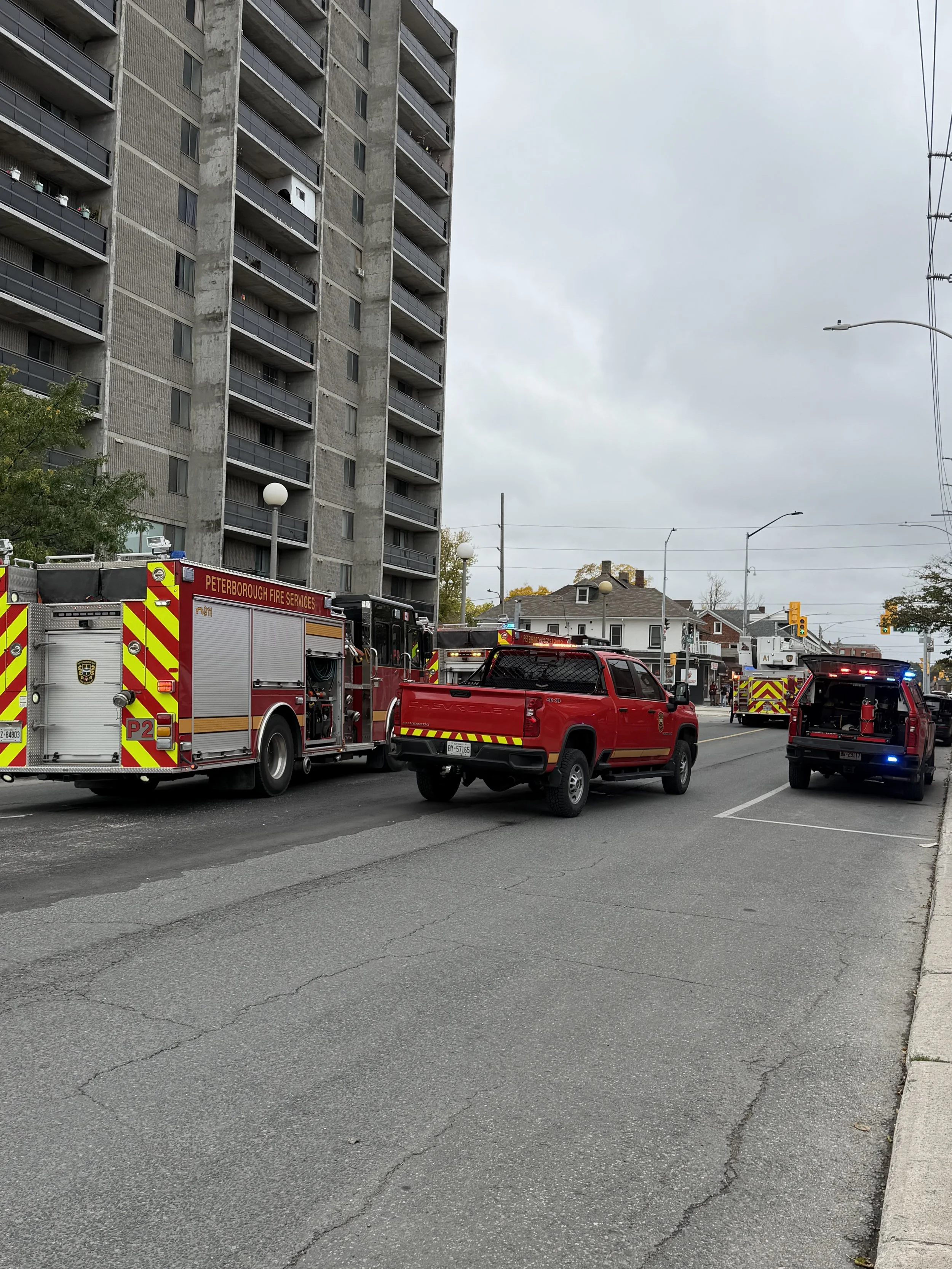 Firefighters respond to a balcony fire on the seventh floor of Charlotte Towers in downtown Peterborough on October 14th.