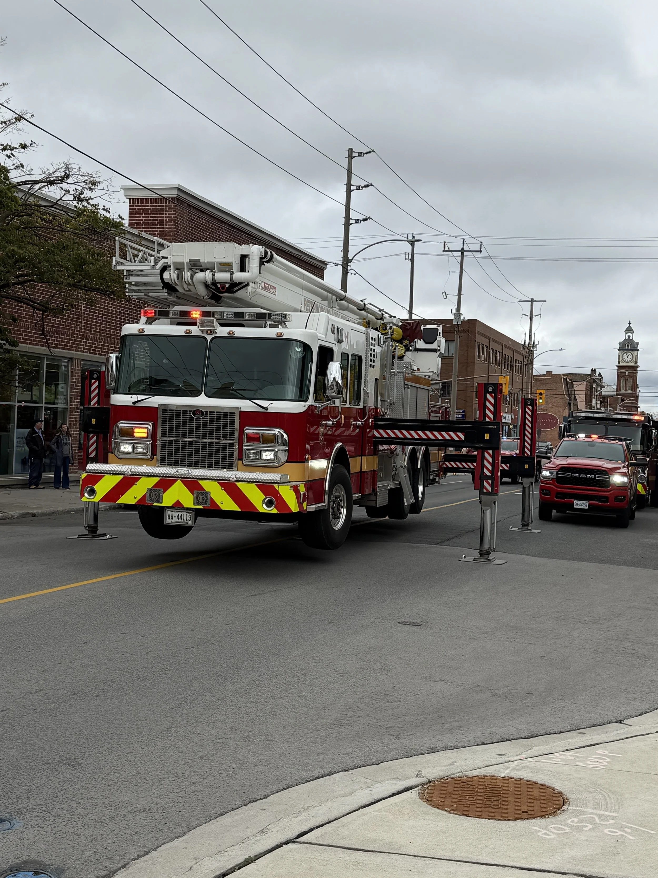 Firefighters respond to a balcony fire on the seventh floor of Charlotte Towers in downtown Peterborough on October 14th.