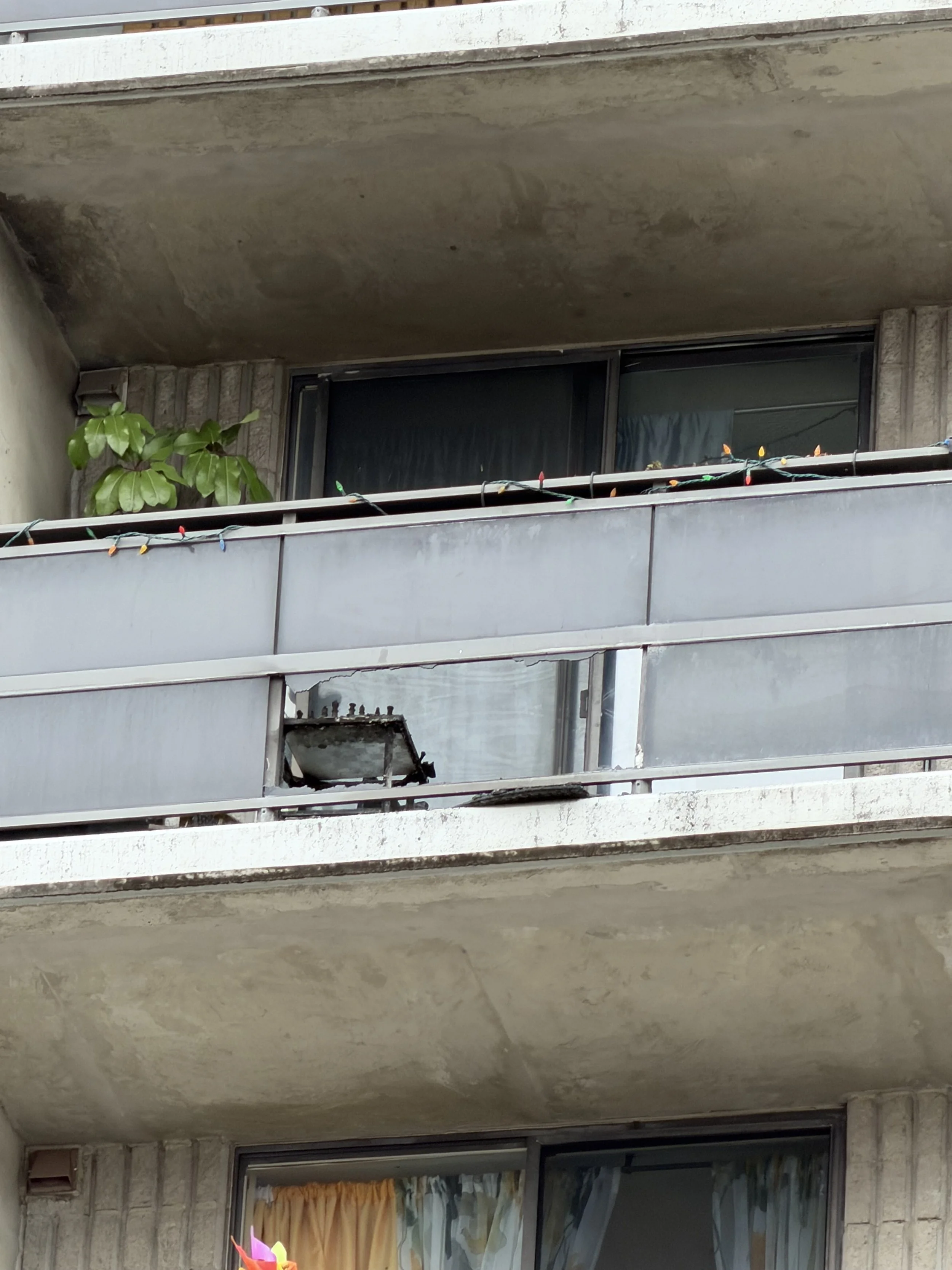 Firefighters respond to a balcony fire on the seventh floor of Charlotte Towers in downtown Peterborough on October 14th.