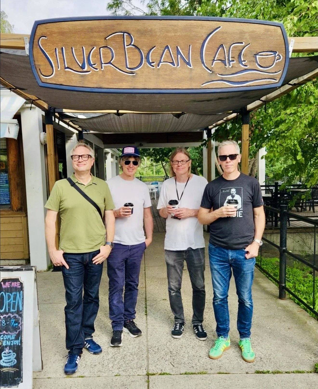 The destination was the Silver Bean Cafe, a popular stop along the trail, where the four musicians stopped for a photo before continuing their Peterborough adventure.