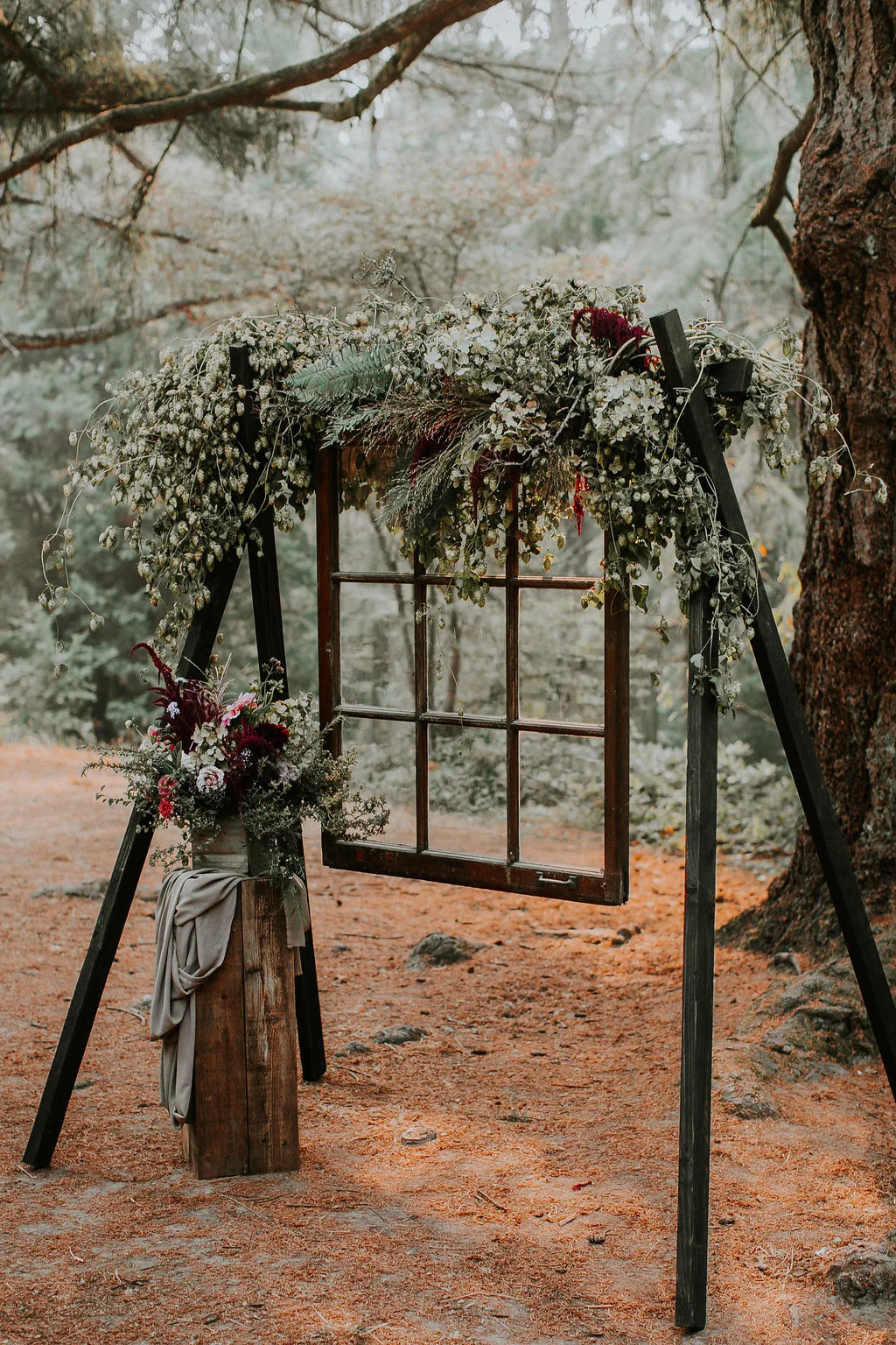 Woodland arch with hops and boho window