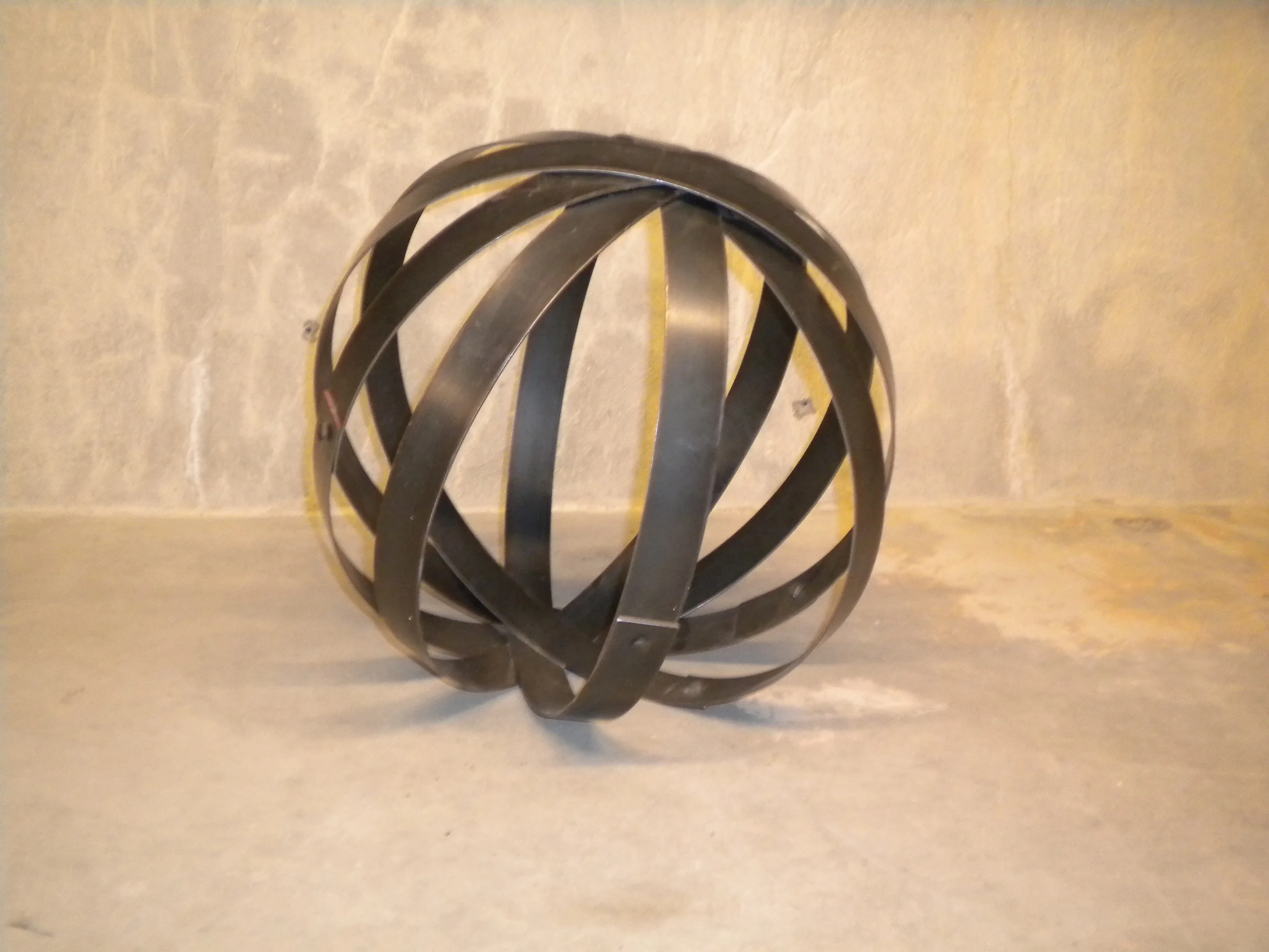   enclose.   18’ diameter.  Steel straps and rivets. 