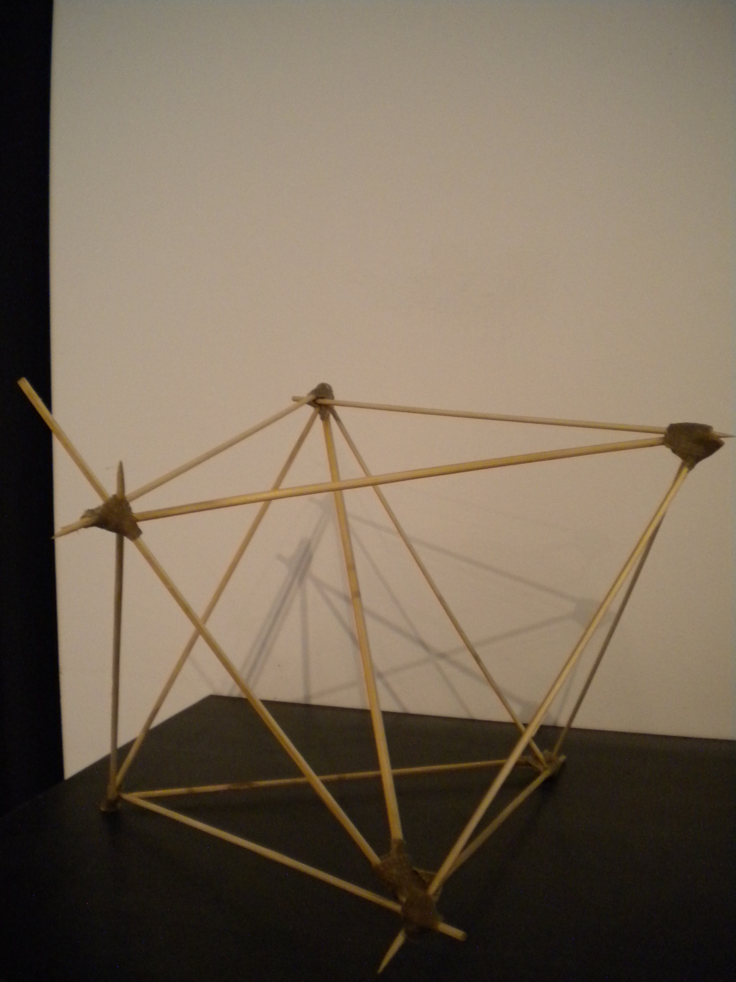   water molecule.   9”x 11”x 7”.  Bamboo skewers and wax tape. 